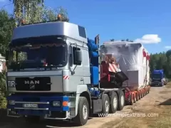 Oversized cargo loading and securing on railway platforms and low bed wagons