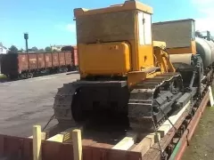 Delivery of road construction equipment by railway